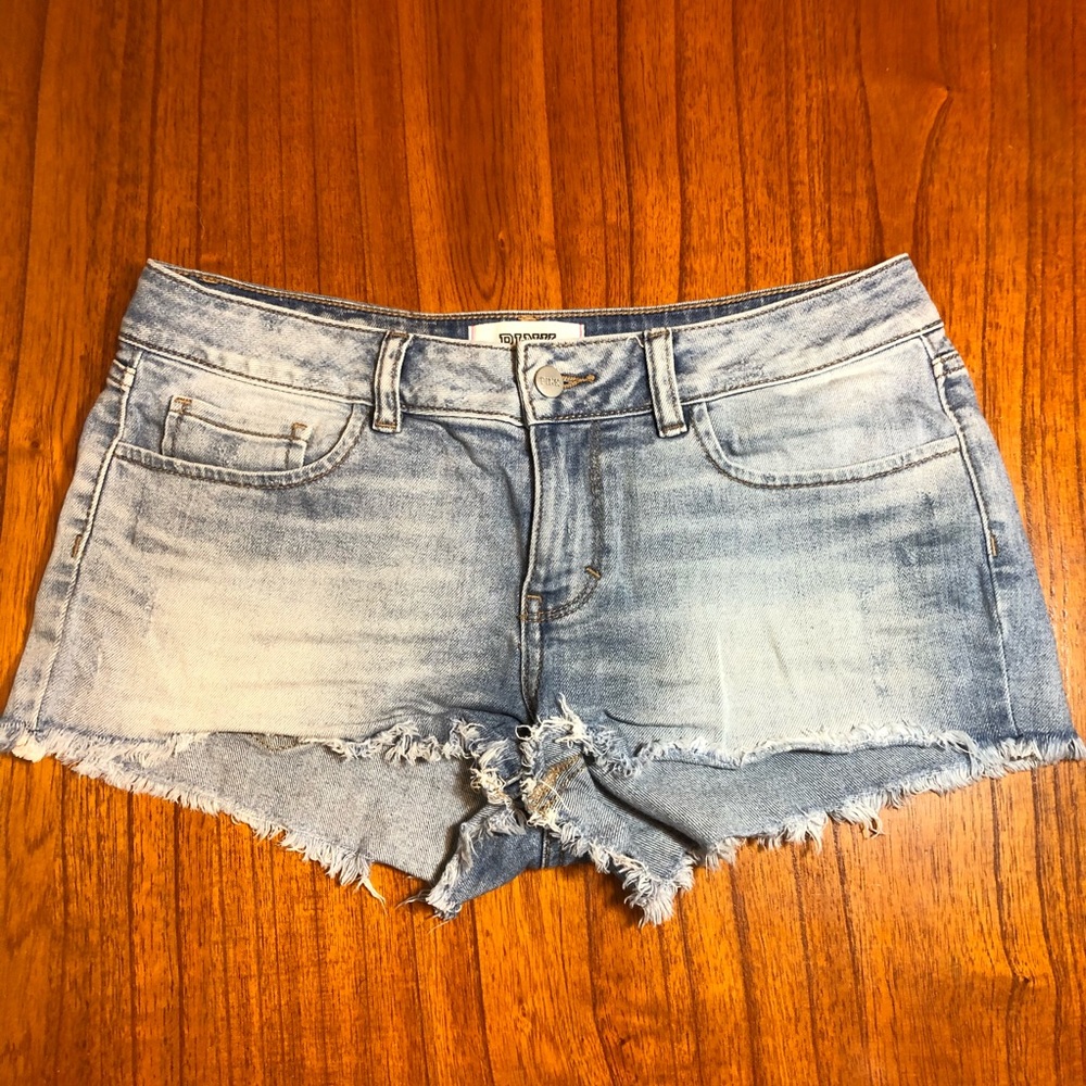 Pink high rise distressed cutoff jean shorts